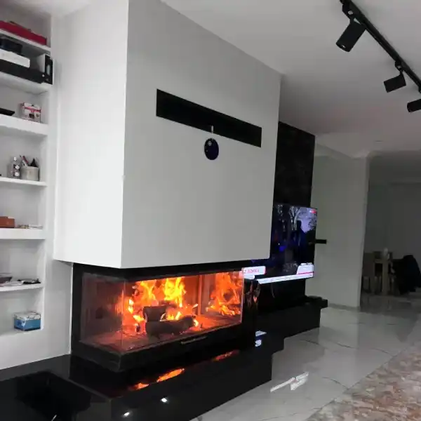 Modern şömine modelleri – üç tarafı camlı odunlu şömine tasarımı
